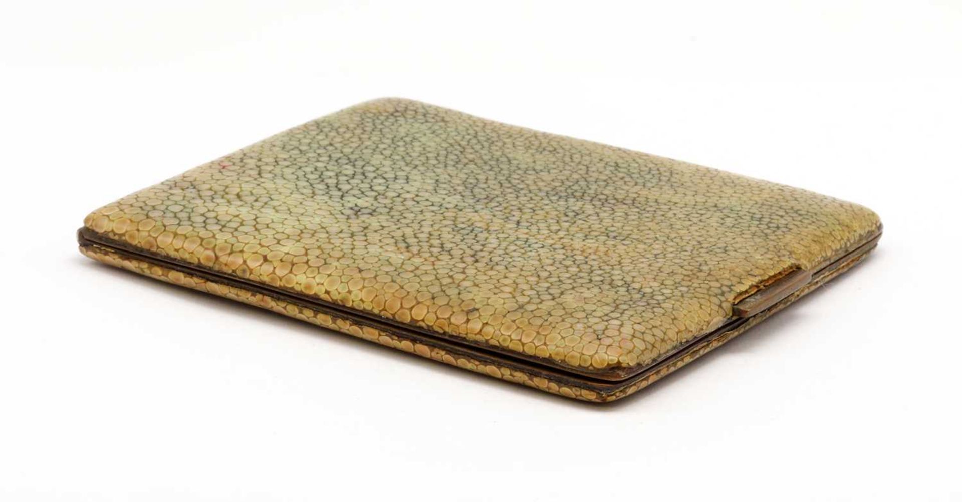 A gilt metal shagreen cigarette case,