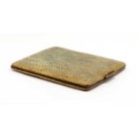 A gilt metal shagreen cigarette case,