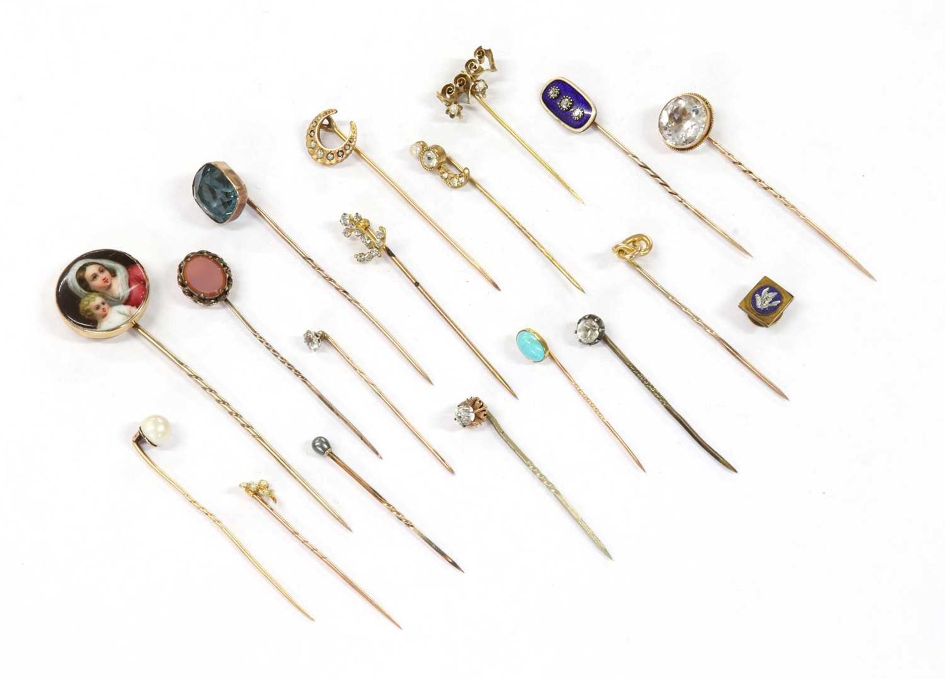 A collection of stick pins,