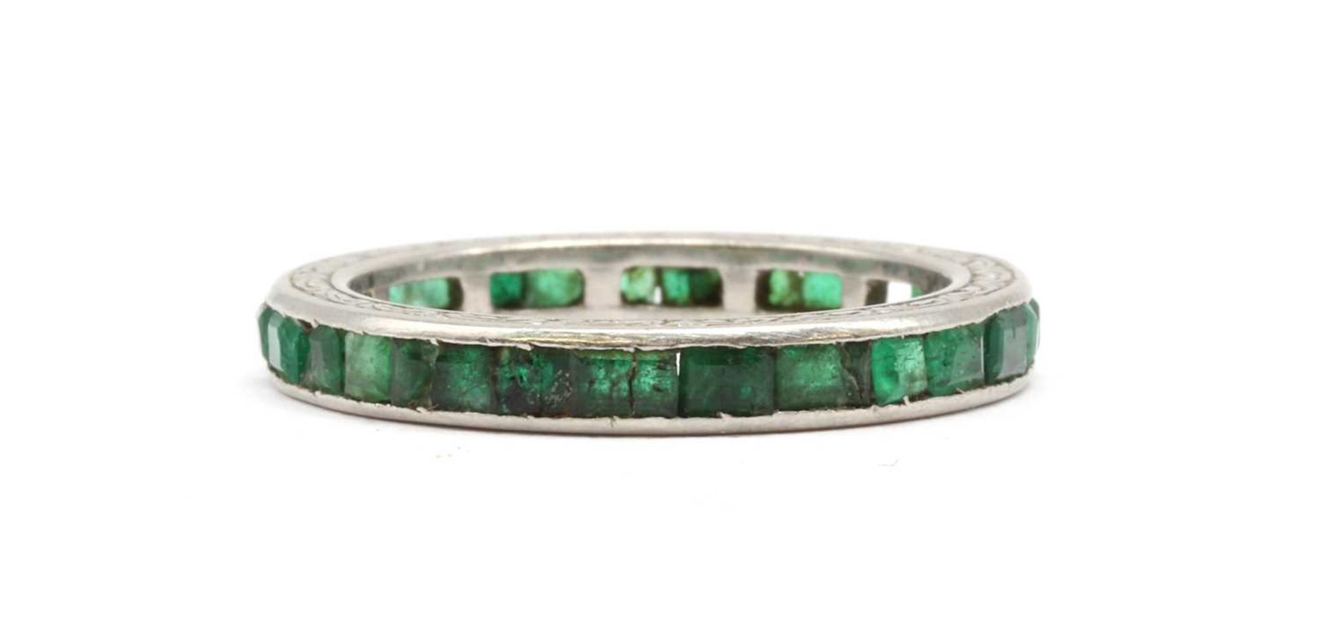 An emerald full eternity ring,
