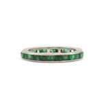 An emerald full eternity ring,