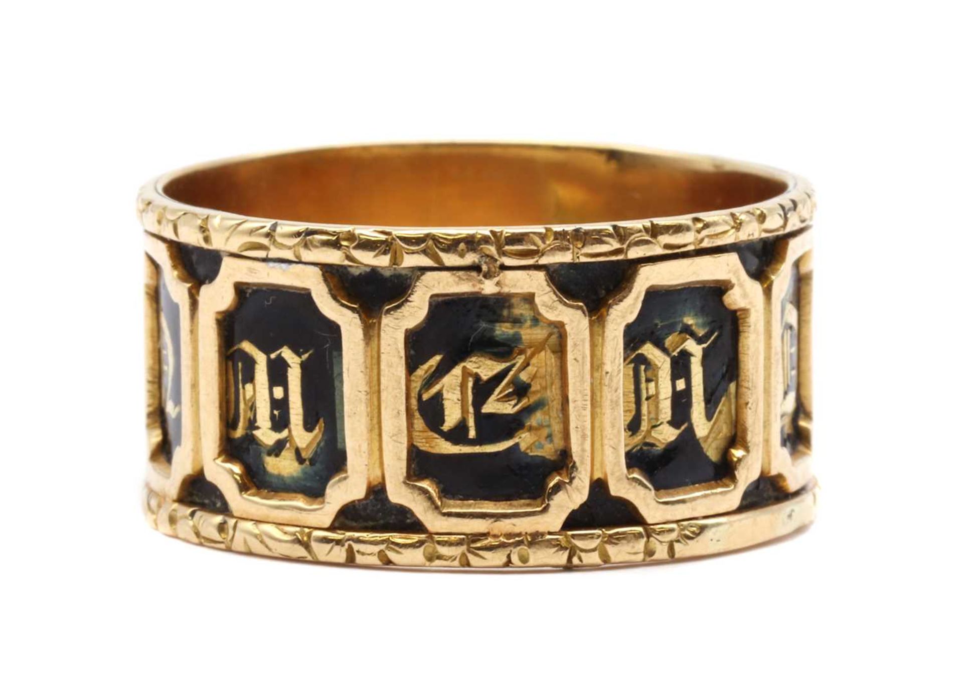 A gold enamel memorial ring,