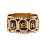 A gold enamel memorial ring,