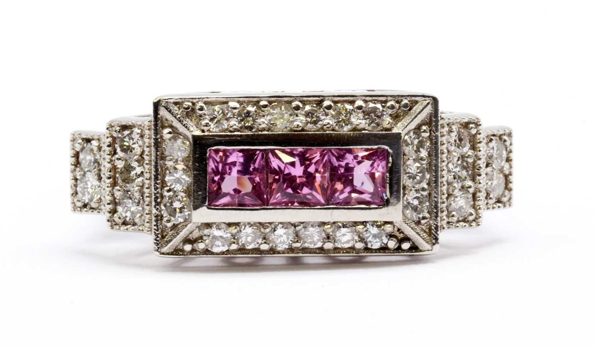 A platinum pink sapphire and diamond ring,