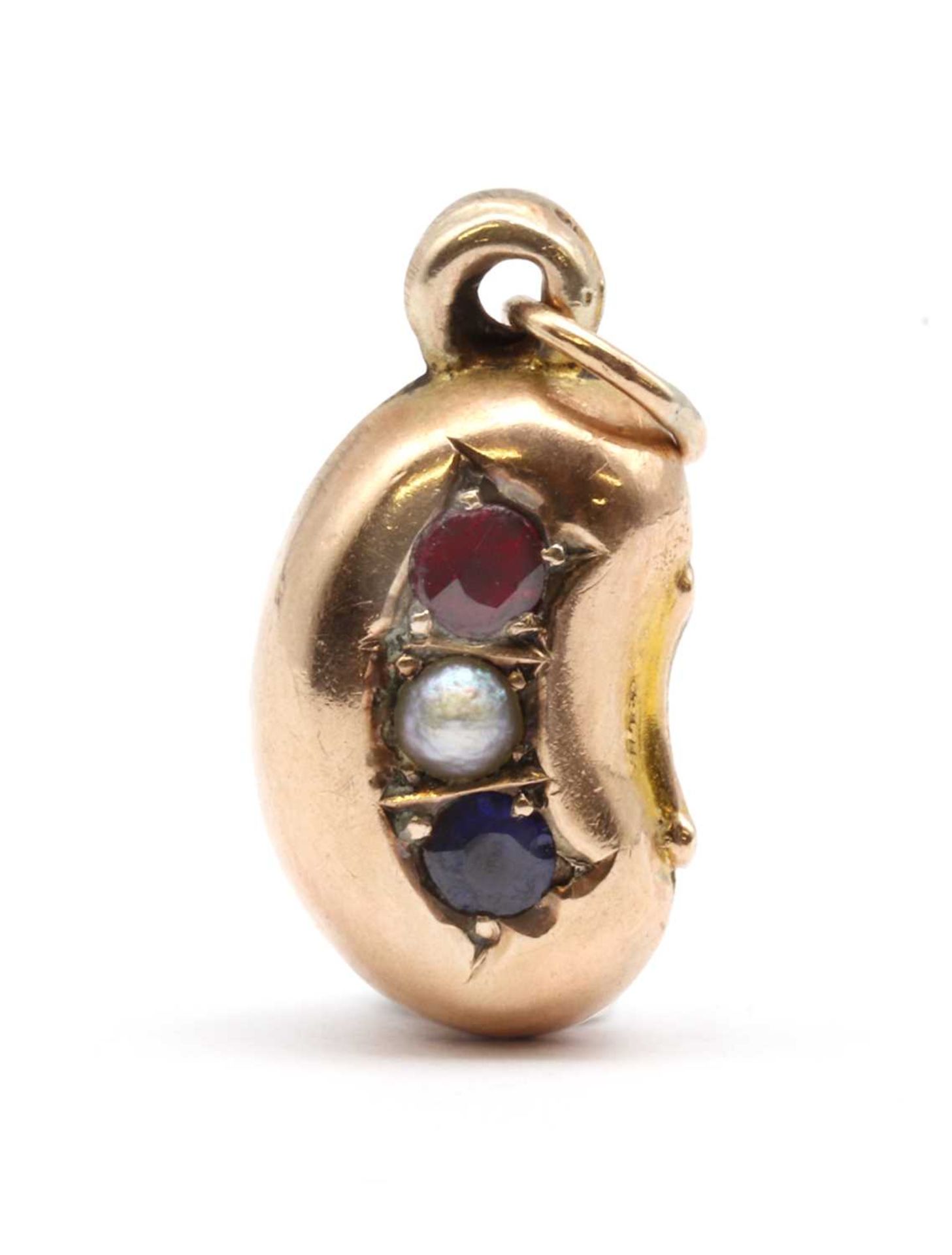 A Victorian 9ct gold hollow bean charm,
