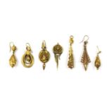 A collection of Victorian gold single earrings and components,