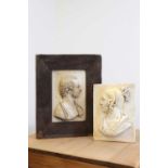 A pair of carved marble reliefs,