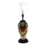 A Moorcroft pottery 'Anna Lily' pattern table lamp