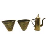 A pair of eastern brass jardinieres,