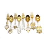 Four pairs of Danish silver Christmas spoon and fork sets by A. Michelsen