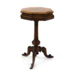 A Victorian octagonal walnut tripod work table,