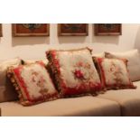 A group of three Aubusson cushions,