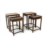 A pair of Chinese hardwood nest of two bedside tables,
