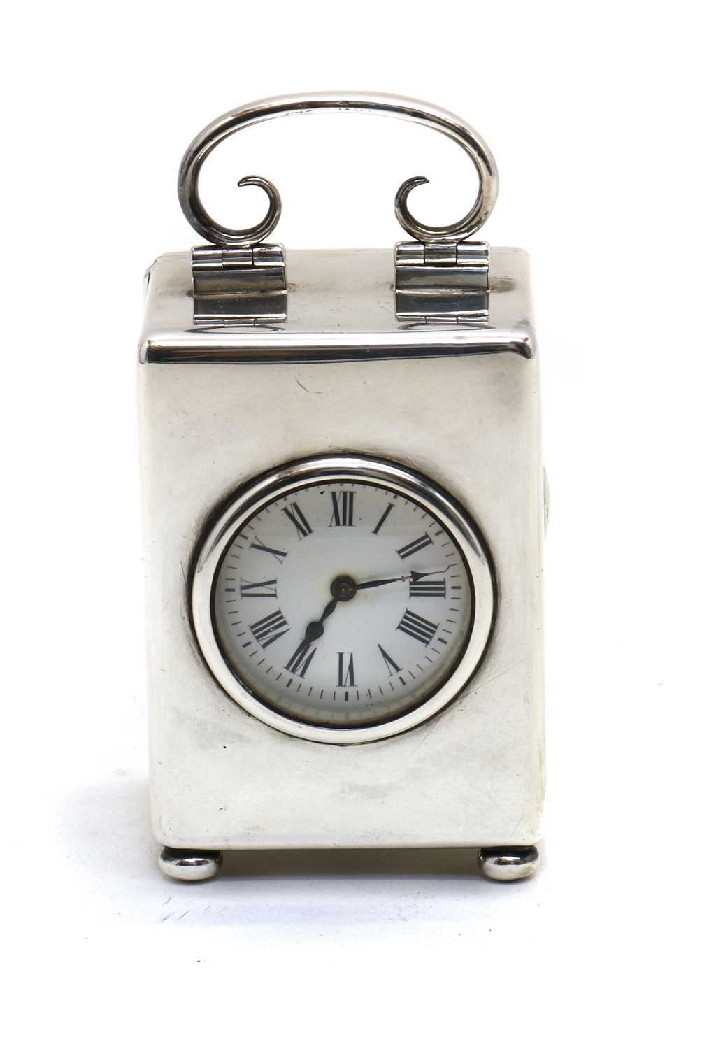 A miniature silver carriage timepiece,