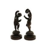 A pair of bronze figures