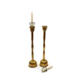 A pair of gilt candlesticks,