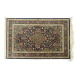 A Persian signed silk rug,