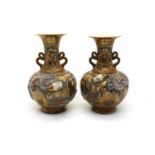 A pair of Japanese Satsuma pottery vases,