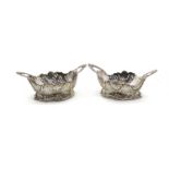 A pair of pierced continental silver baskets,