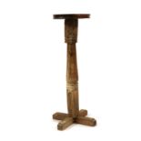 A hardwood jardiniere stand,