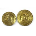 Two Arts and Crafts brass dishes,