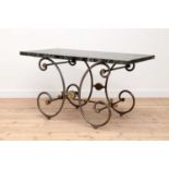 A steel and brass baker's table,