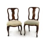 A near pair of Dutch walnut and marquetry side chairs,