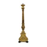A carved and giltwood standard lamp,