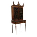 A mahogany display cabinet on stand,