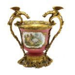 A 19th century French porcelain bowl with ormolu mounts