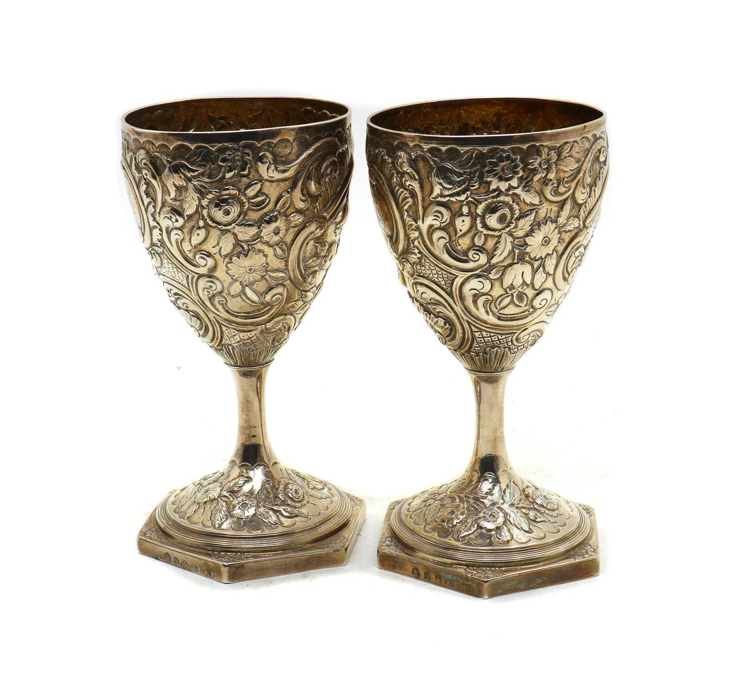 A pair of George III silver goblets