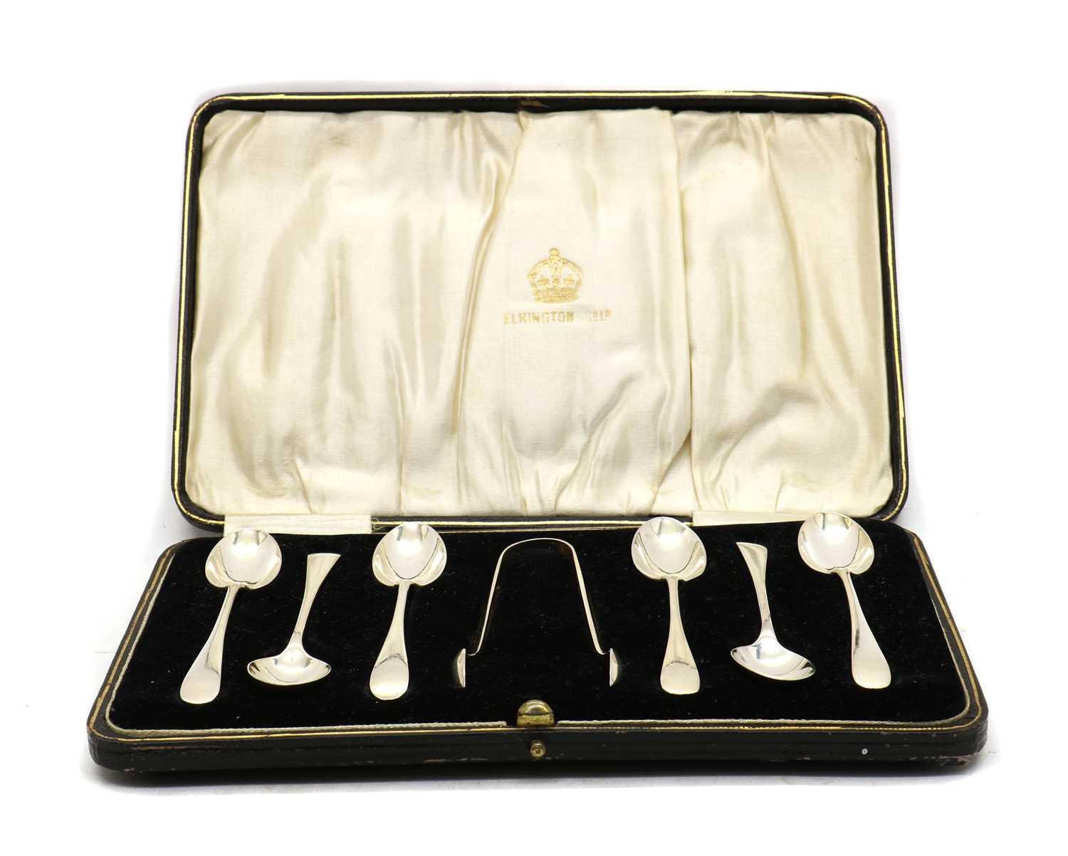 A set of silver teaspoons and sugar tongs,