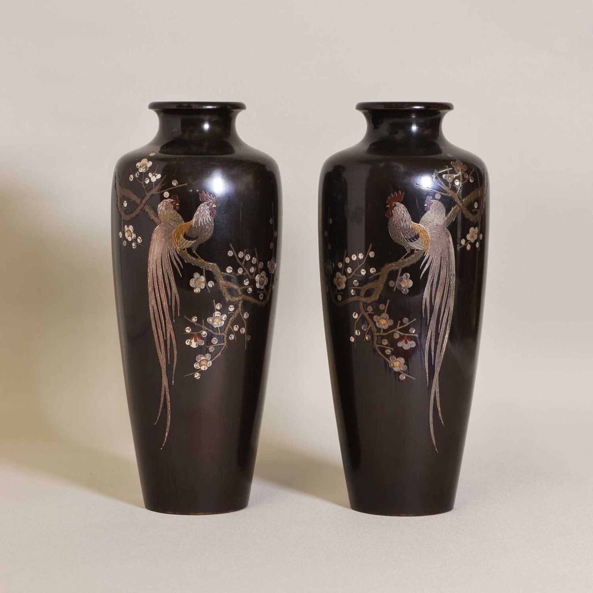 A pair of Japanese bronze vases,