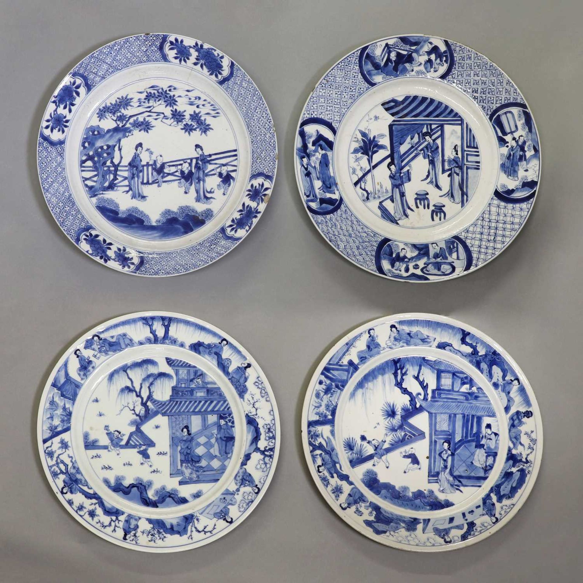 A collection of four Chinese blue and white plates,