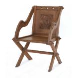 An oak Glastonbury chair,