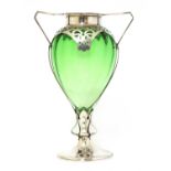 An Arts and Crafts green glass and silver-mounted vase,