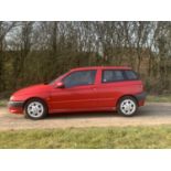 A 1996 Alfa Romeo 145 Cloverleaf three-door hatchback,