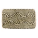 A ‘zebra skin’ rug,