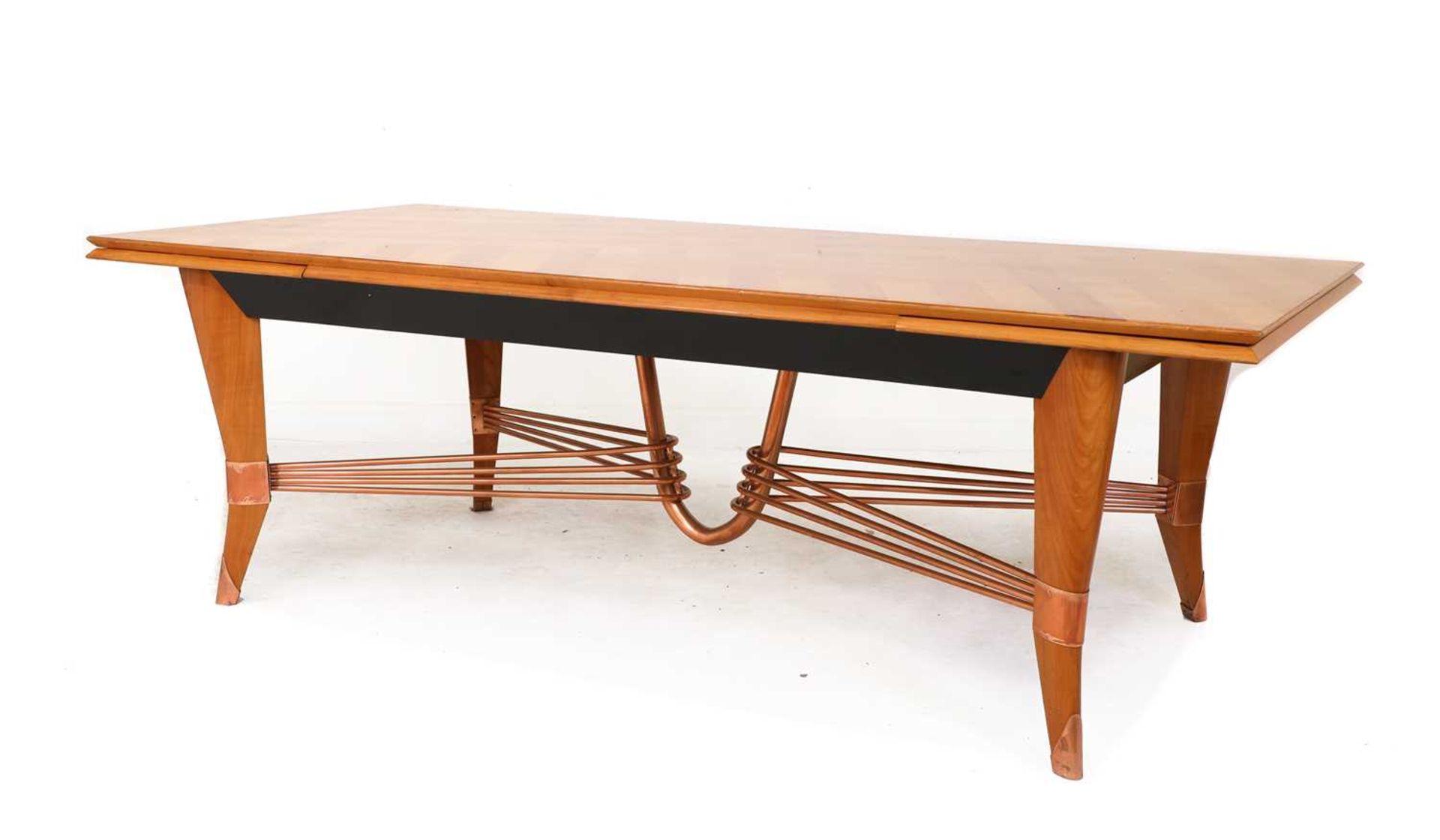 An Art Deco maple dining table,