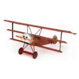 A scale model of a World War 1 Fokker Dr. 1 fighter Triplane,