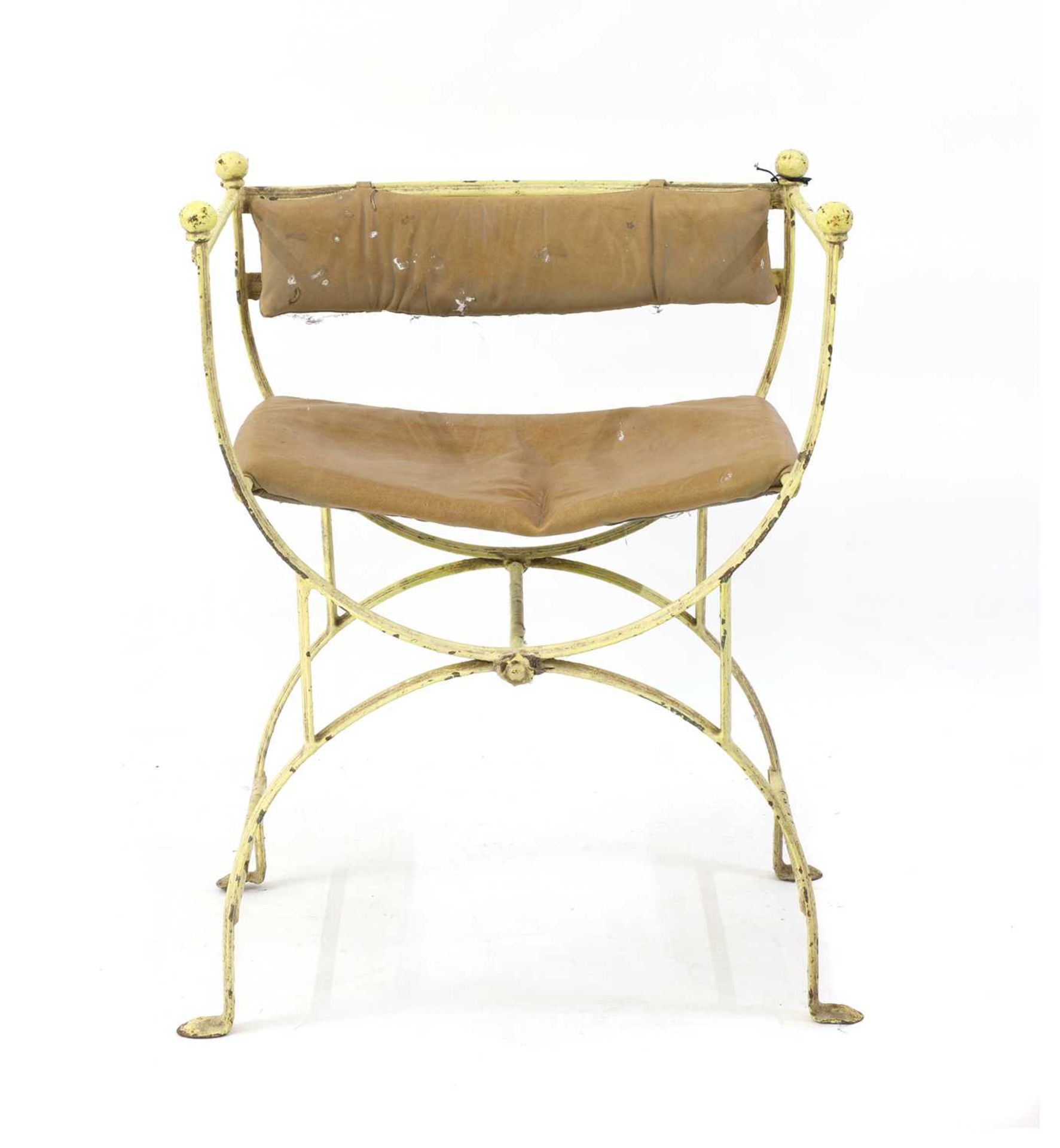 A Continental iron painted 'X' frame armchair,