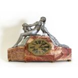 An Art Deco spelter and marble mantel clock,