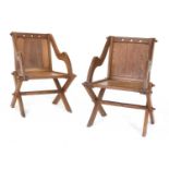 A pair of oak Glastonbury chairs,