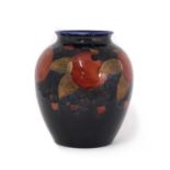 A William Moorcroft pottery ‘Pomegranate’ pattern vase,