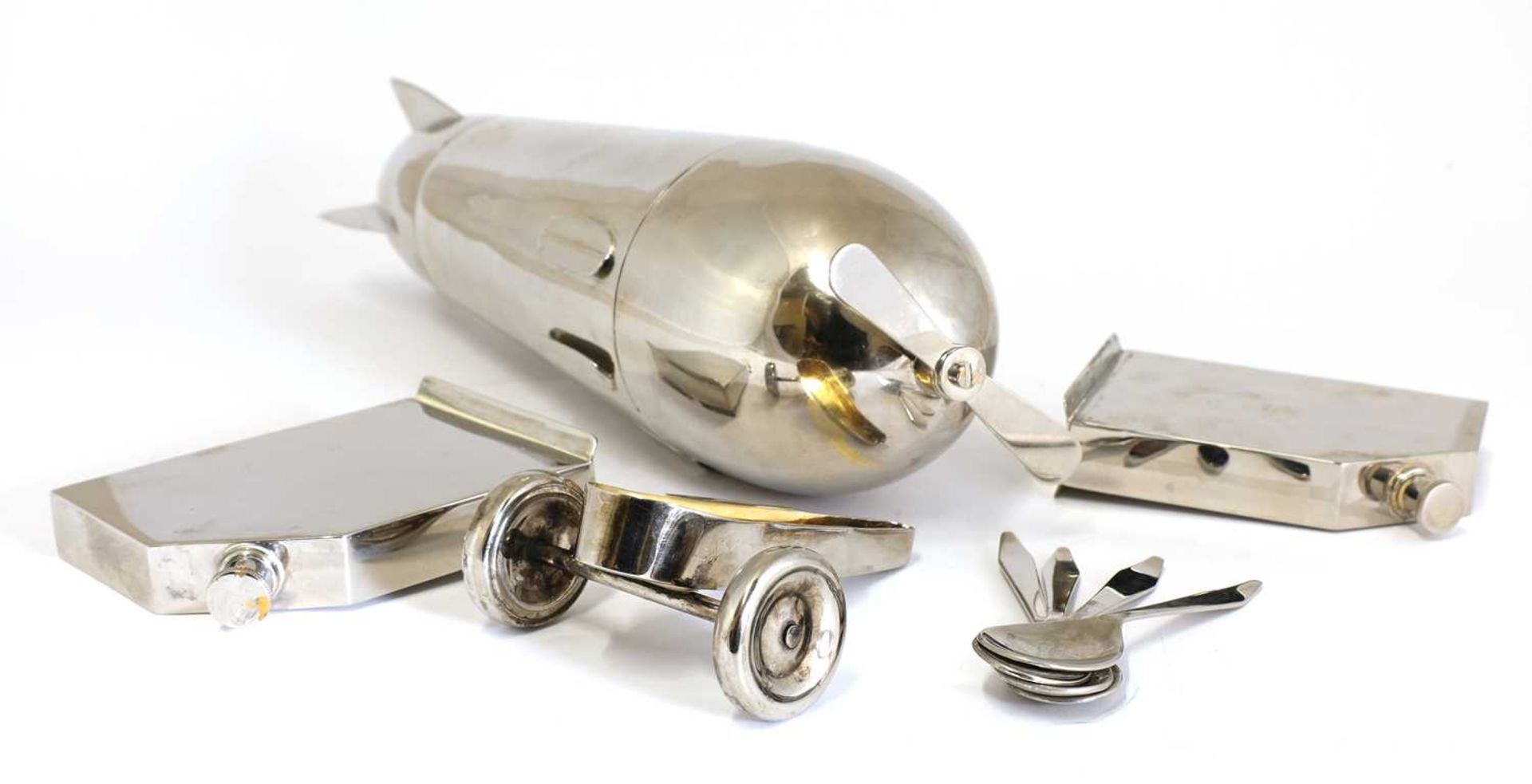 A novelty silver-plated 'monoplane' travelling bar cocktail set, - Image 6 of 8