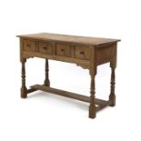 A limed oak side table,