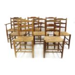 A matched set of eight Arts and Crafts 'Gimson' oak and ash ladder back chairs,