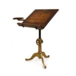 Frank Lloyd Wright interest: a painted cast iron and pine architect's table,