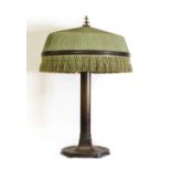 A patinated bronze Art Nouveau table lamp,