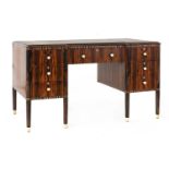 An Art Deco Macassar and ivory-inlaid desk,